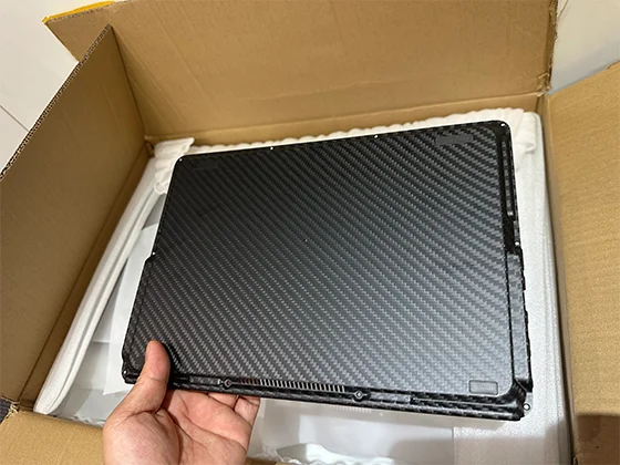 1mm carbon fiber sheet used as electronics enclosure cover on laptop and devices