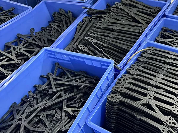 International buyer inspecting carbon fiber products at YTCarbon