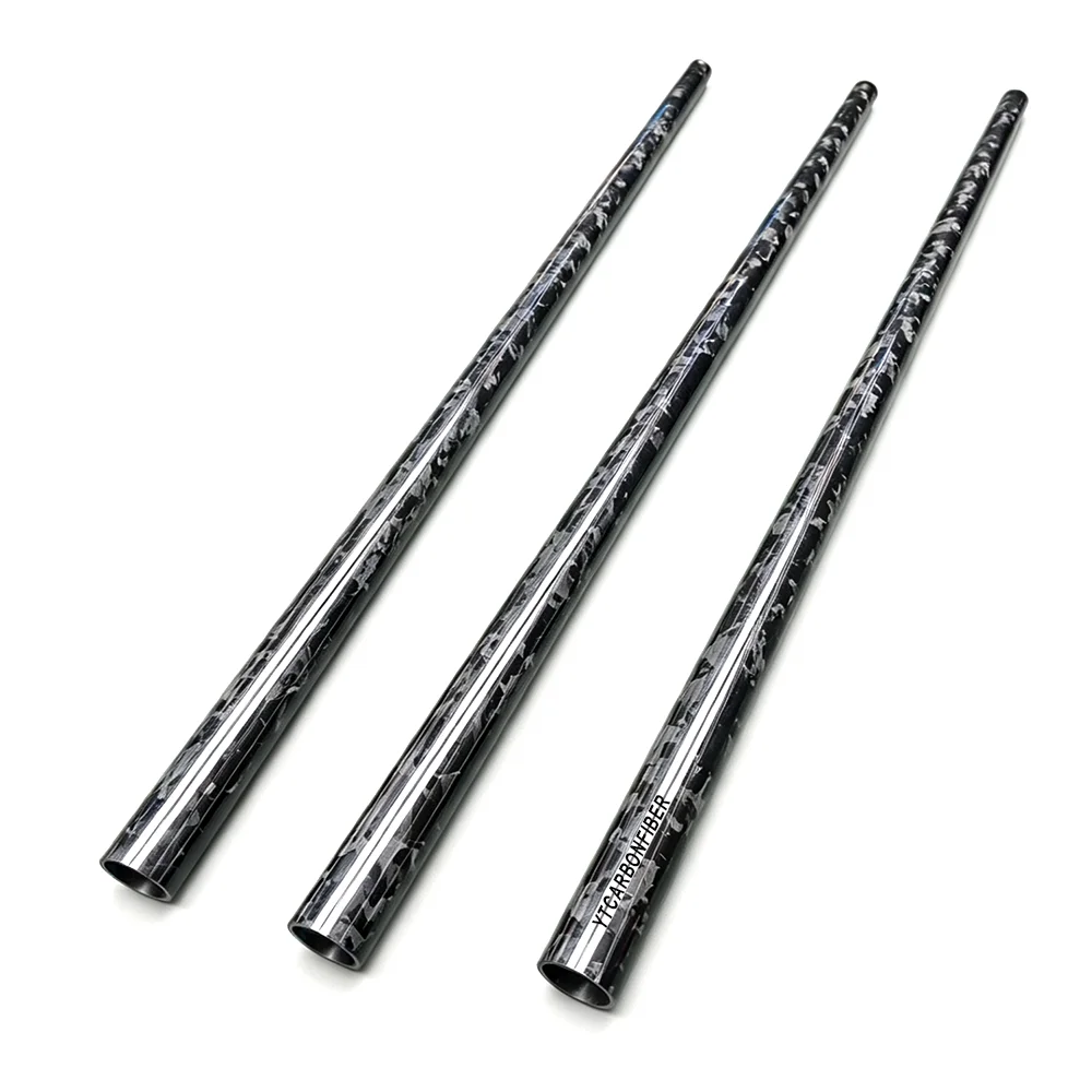 Forged carbon fiber tube side angle view showing marbled texture