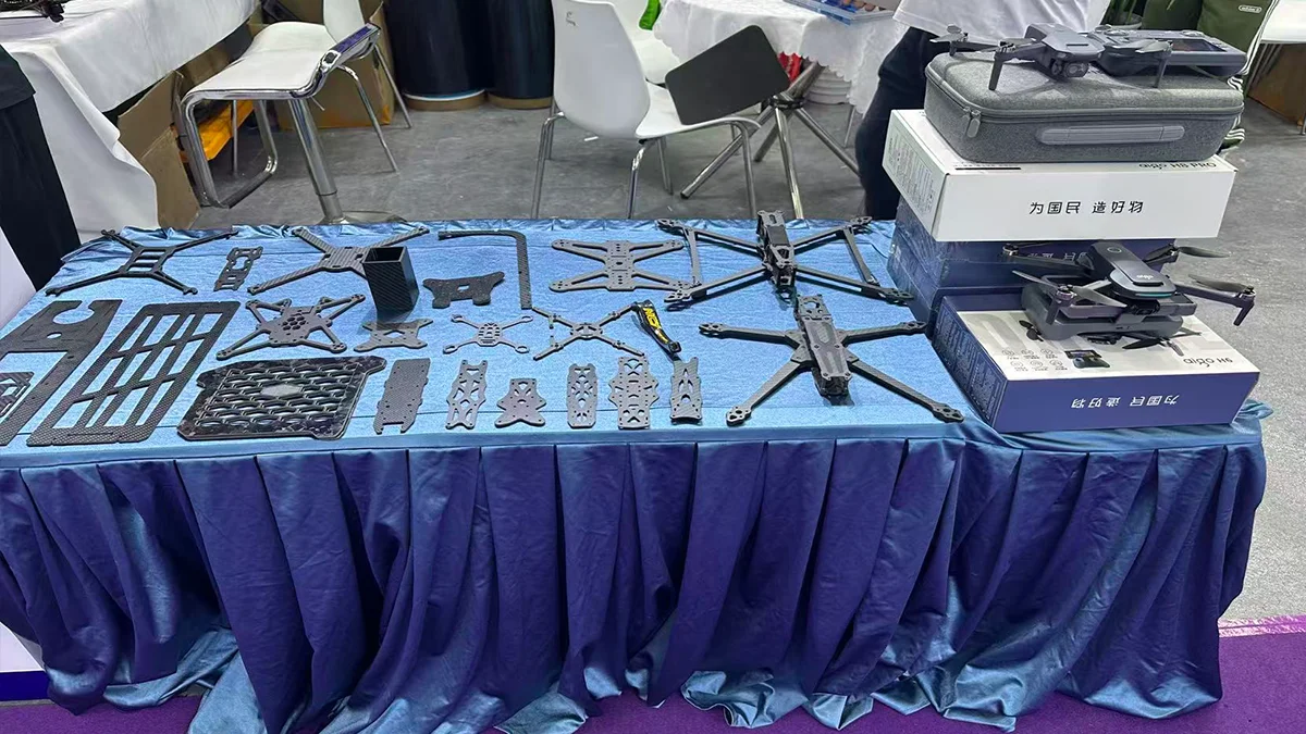 High-precision multi-axis CNC cut carbon fiber drone frames and 100% pure prepreg composite structural plates.