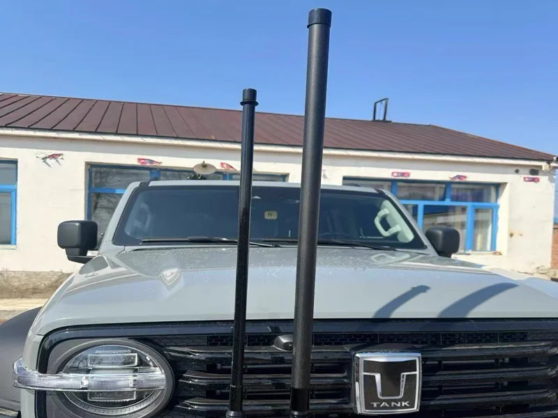 Carbon fiber antenna mast installed outdoors demonstrating wind load resistance in real conditions
