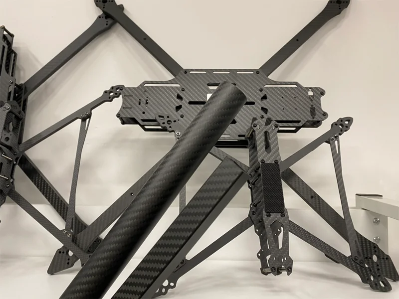 Roll-wrapped carbon fiber drone arms and booms for multirotor UAVs