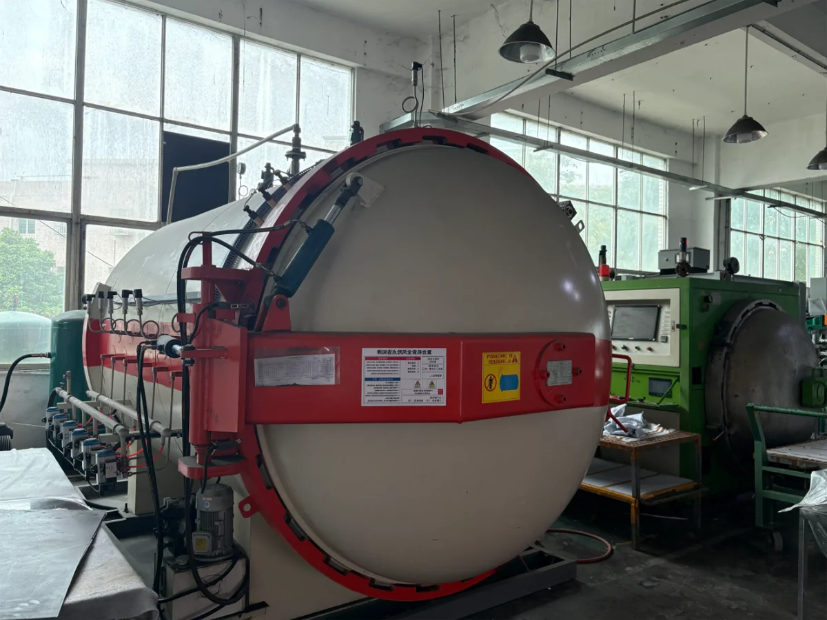 Hot press machine producing carbon fiber sheets at YTCarbon factory
