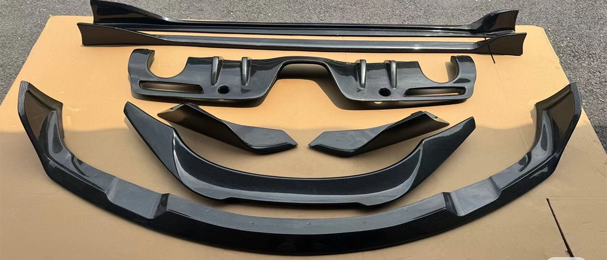 Complete line of automotive carbon fiber components and custom racing parts