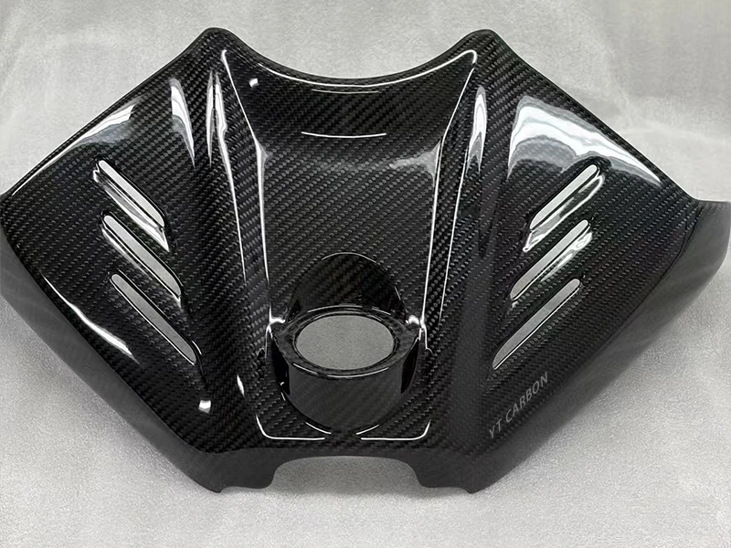 Lightweight carbon fiber EV battery enclosure lid and structural chassis reinforcement