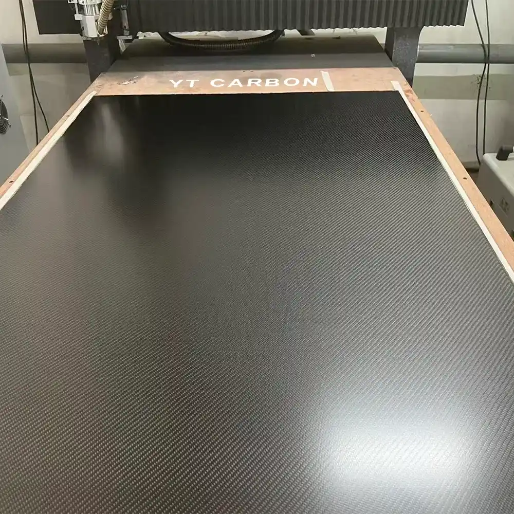 Precision CNC cut flame retardant carbon fiber panel with countersunk holes