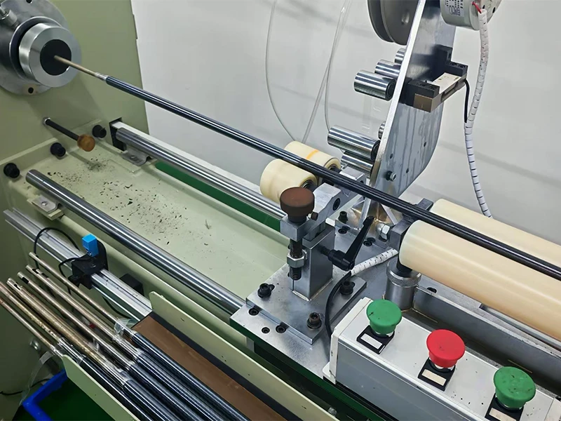 Multi axis roll wrapping production line for structural carbon tubes