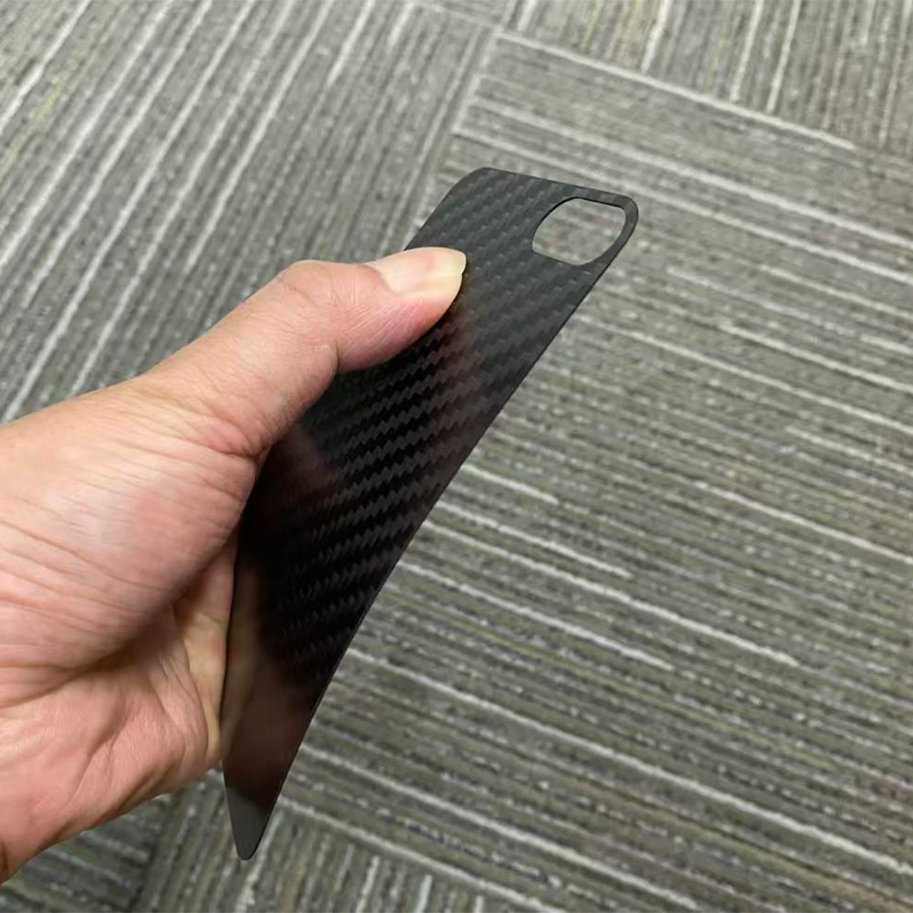 Ultra-thin flexible 0.5mm carbon fiber sheet showing elastic bend radius