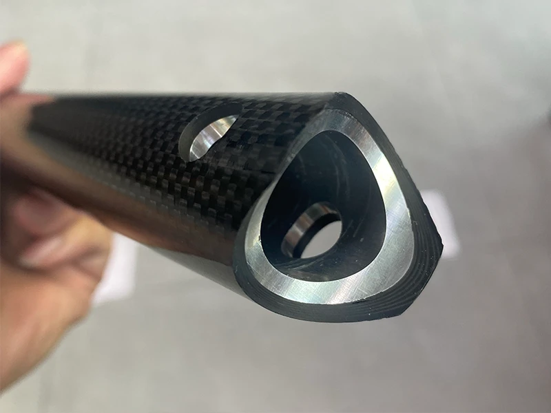 Cross section diagram of carbon aluminum hybrid bicycle tube resisting clamping stress