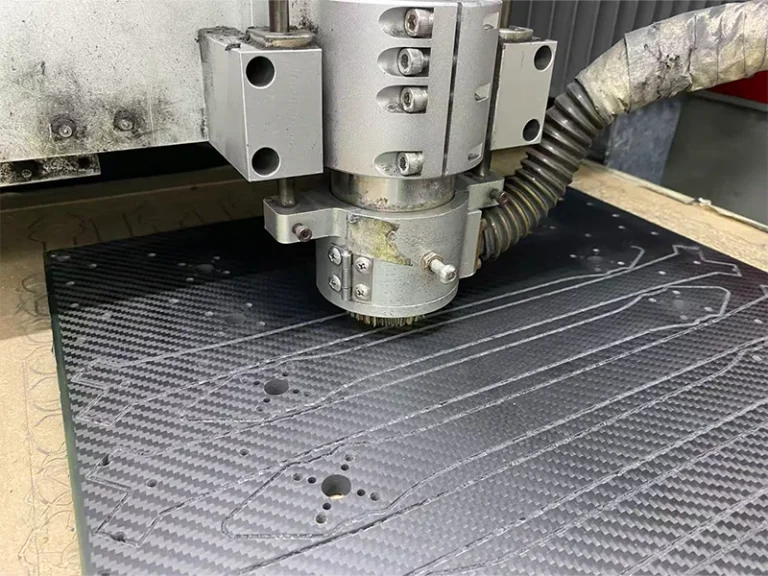 Precision CNC milling of thick carbon fiber sheet using diamond-coated compression router bits