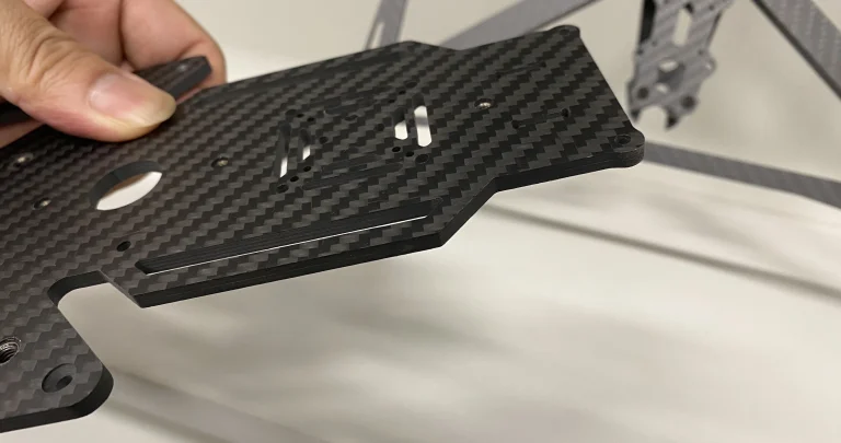 Diamond coated compression router bit delivering clean burr-free carbon fiber edges