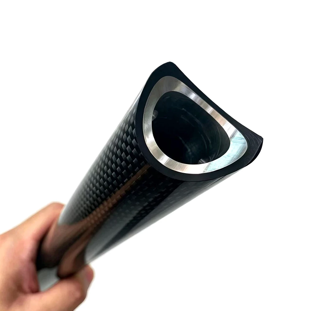 Ultra-high gloss piano mirror finish carbon fiber bike tubing reflecting crisp light